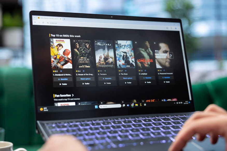 Laptop showing movie options while planning the best months to subscribe to streaming services.